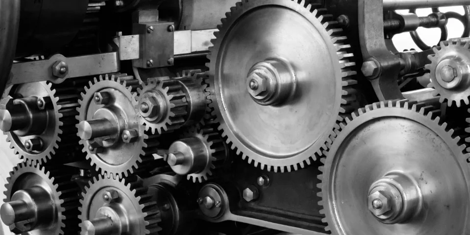Interlocking metal gears in industrial machinery